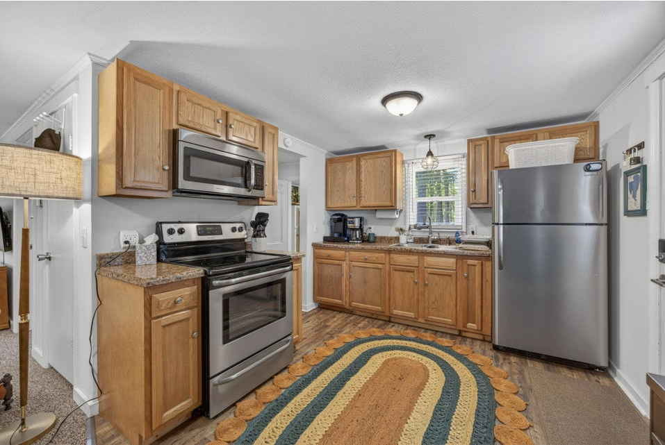 Kitchen with stainless appliances and oak cabinets
